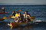Lets catch some super long waves on kayaks