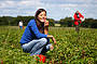 Lady eating strawberries